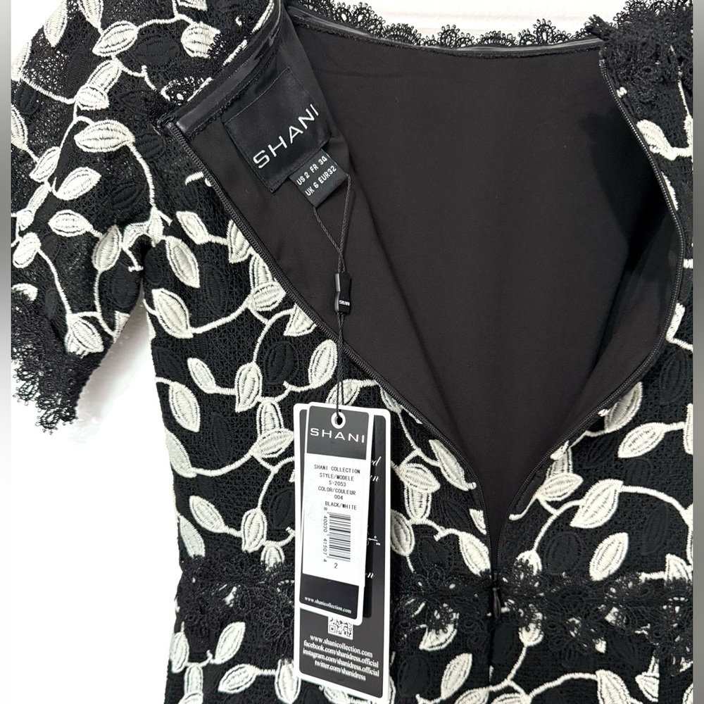 Shani NWT Black/White Two Tone Lace Bateau Neck Ruffle Hem Dress - Picture 5 of 10